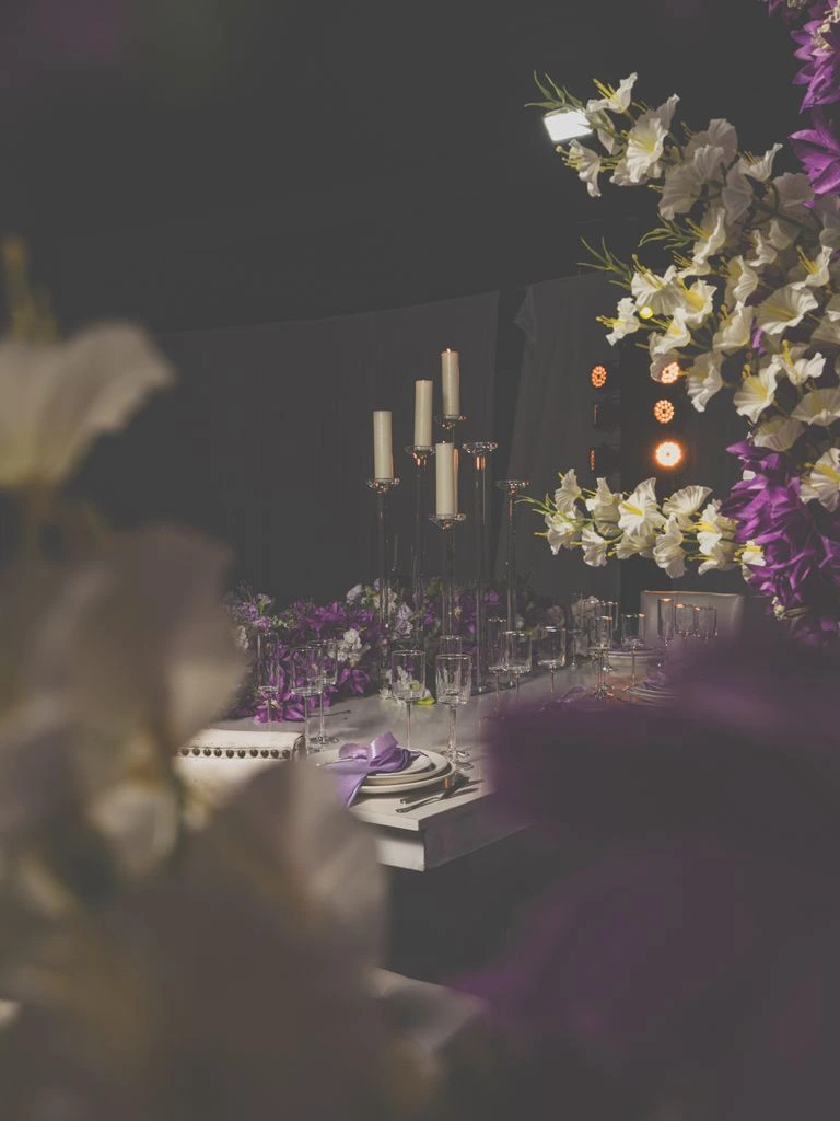A candlelit jungle reception with a glimpse of the Caribbean